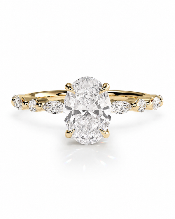 color_10K_YG, color_14K_YG &&A yellow gold diamond ring with a large oval center stone and smaller marquise and round side stones on a white background.