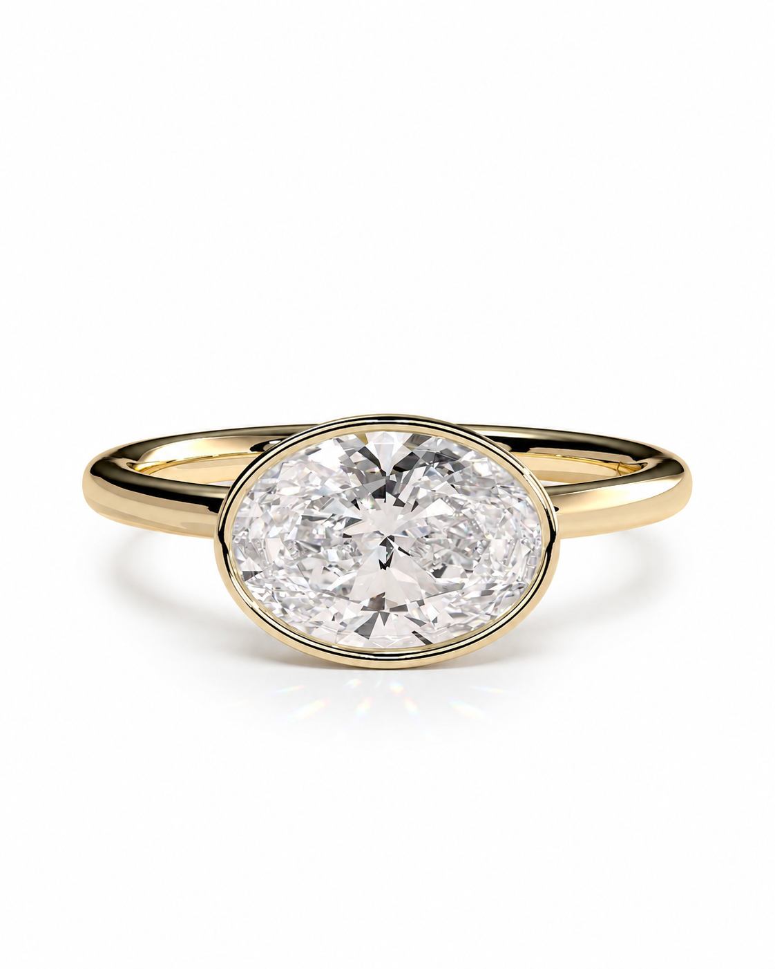 color_10K_YG, color_14K_YG &&An oval diamond engagement ring with a yellow gold band, set against a clean white background.