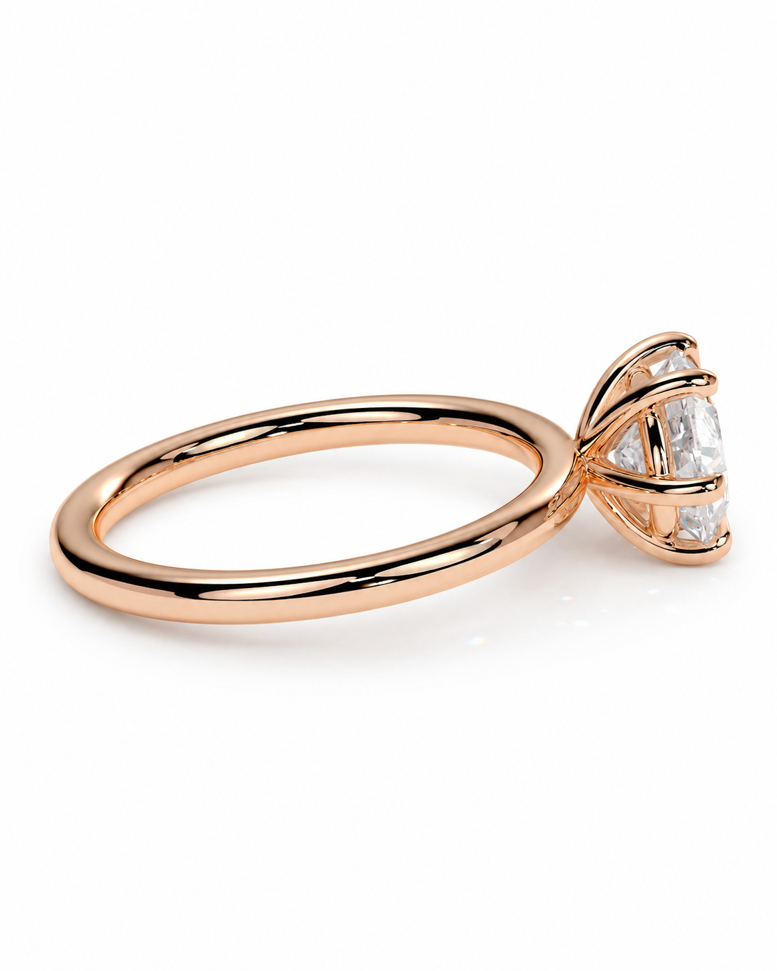 color_10K_RG, color_14K_RG &&
A rose gold ring with a triangular cluster of clear gemstones in a prong setting, shown on a clean white background.