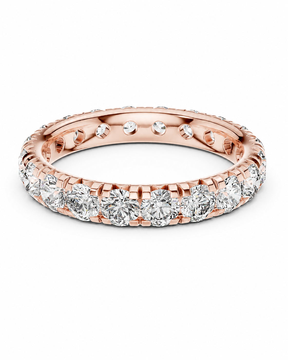 color_10K_RG, color_14K_RG &&	A rose gold eternity ring featuring a continuous row of round-cut clear diamonds on the outer band, with additional diamonds set along the inner band, shown against a plain white background.