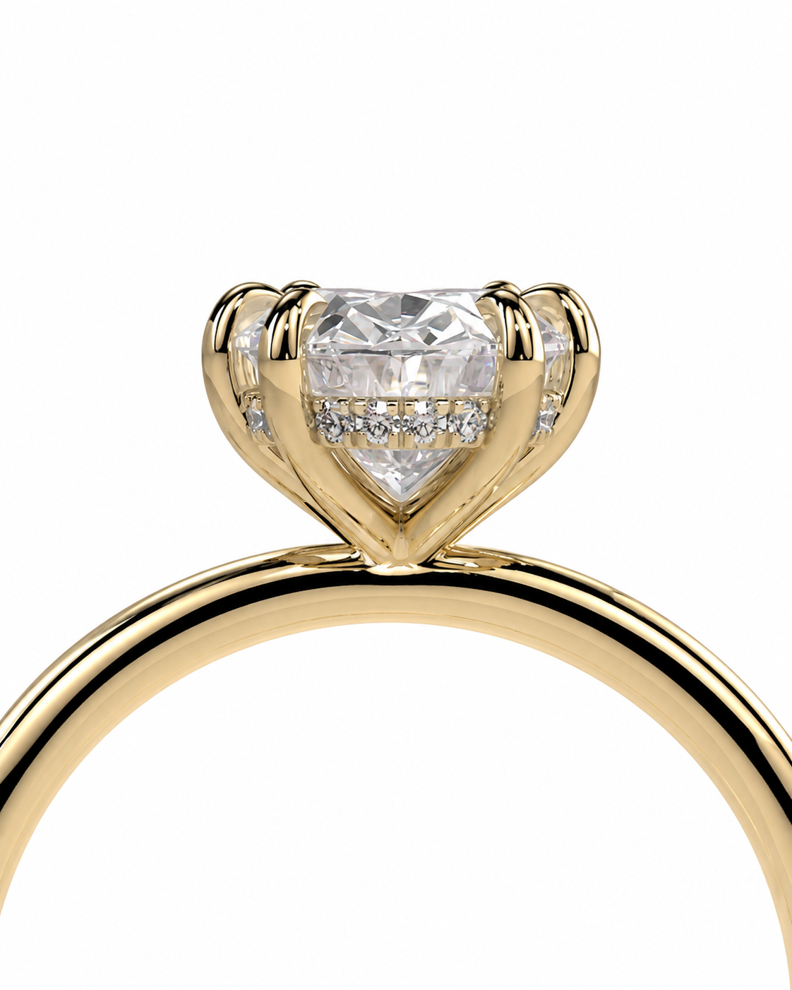 color_10K_YG, color_14K_YG &&A close-up of a yellow gold ring featuring a heart-shaped diamond center stone with small accent diamonds along the band, set against a plain white background.