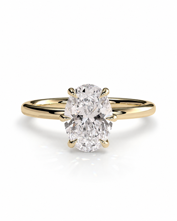 color_10K_YG, color_14K_YG && yellow gold solitaire engagement ring featuring a large oval-cut diamond, set against a clean white background with a soft reflection.