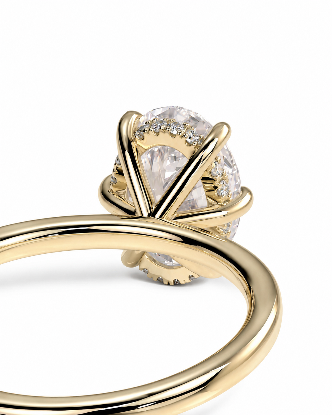 color_10K_YG, color_14K_YG &&A close-up of a yellow gold ring featuring a large oval clear gemstone in a wrap-style setting with small accent diamonds, shown on a white background.