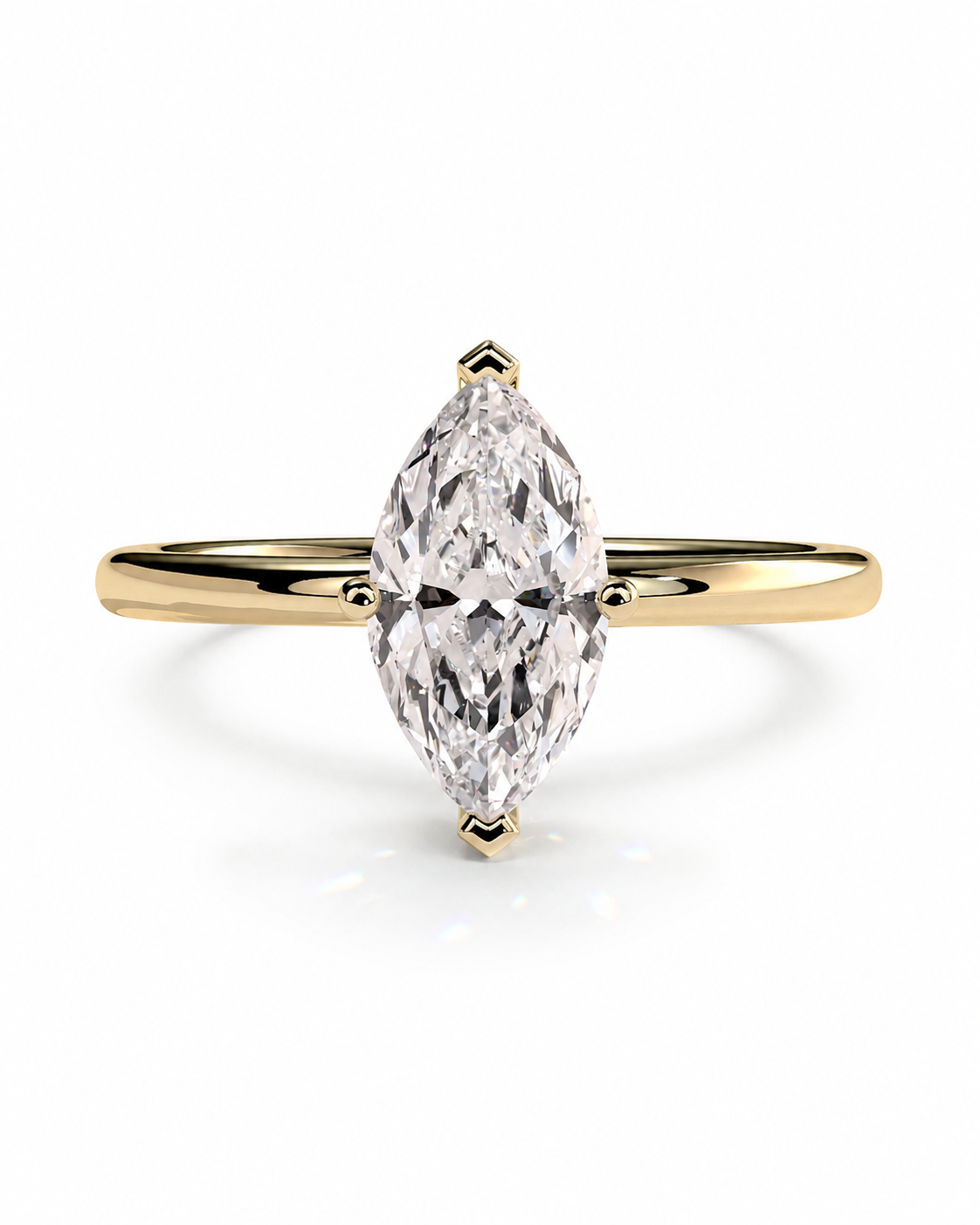 color_10K_YG, color_14K_YG &&A yellow gold ring featuring a marquise-cut clear gemstone in a four-prong setting, shown against a clean white background.