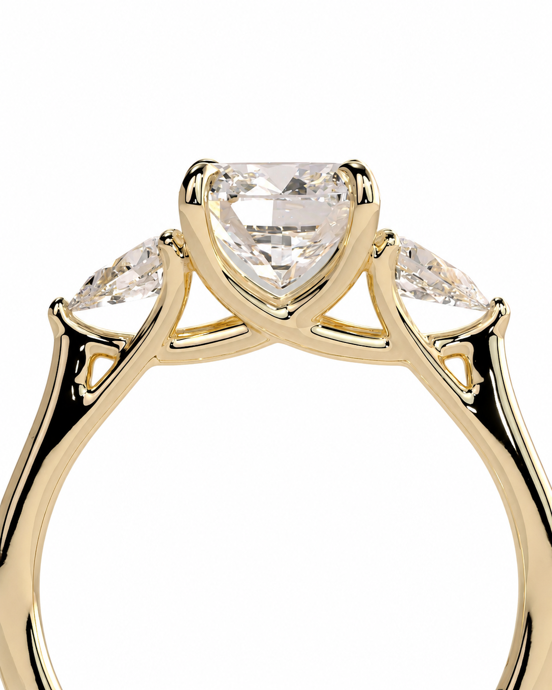 color_10K_YG, color_14K_YG &&A close-up of a yellow gold ring featuring a large heart-shaped clear gemstone in the center, flanked by two smaller marquise-cut clear gemstones on the shoulders, set against a plain white background.