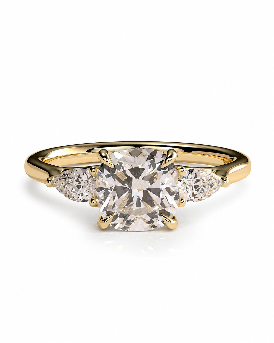 color_10K_YG, color_14K_YG &&A yellow gold three-stone ring featuring a large cushion-cut center diamond flanked by two smaller round diamonds, set against a clean white background.