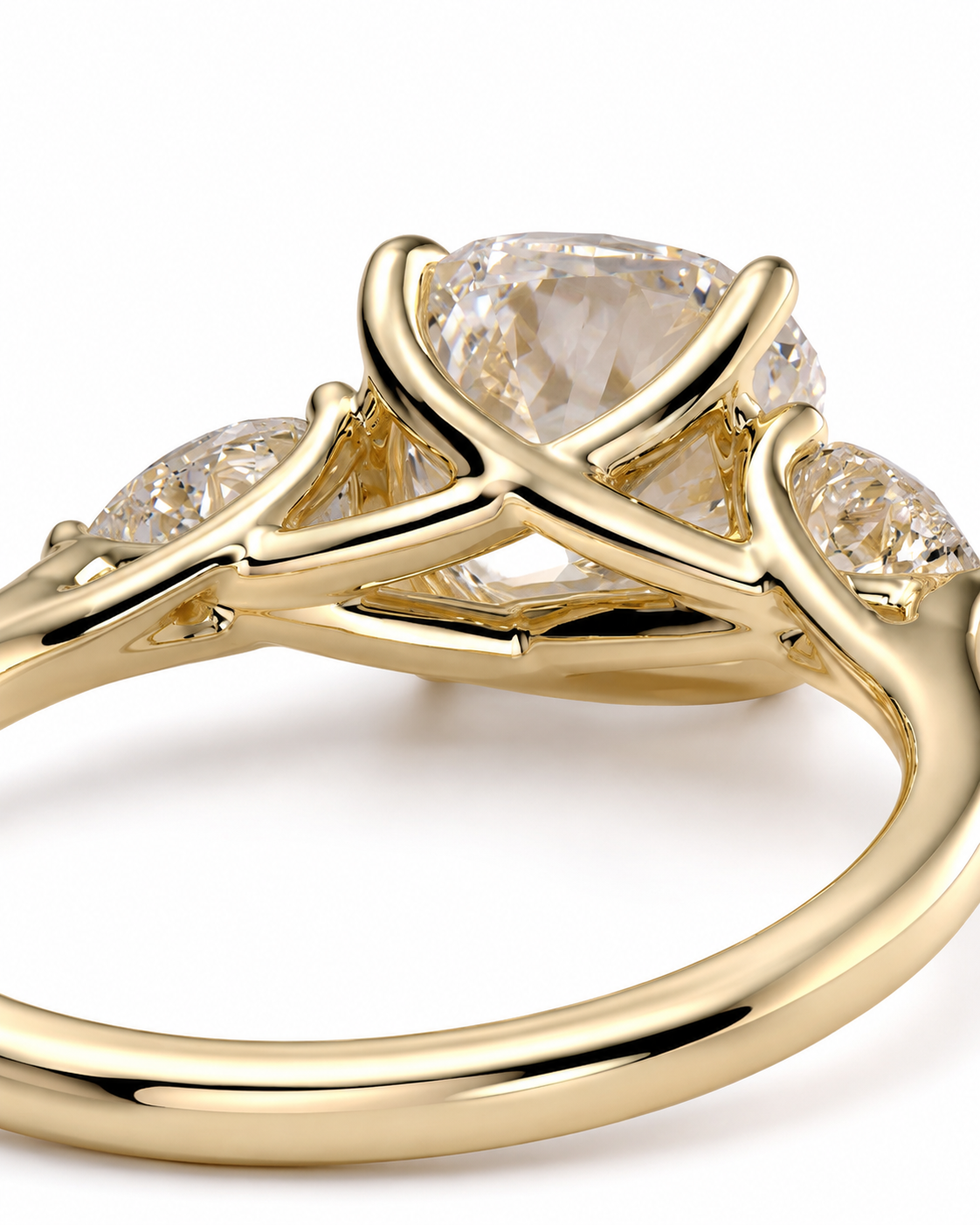 color_10K_YG, color_14K_YG &&A close-up of a yellow gold ring featuring a large oval clear gemstone in a four-prong setting, with smaller round side stones on a white background.