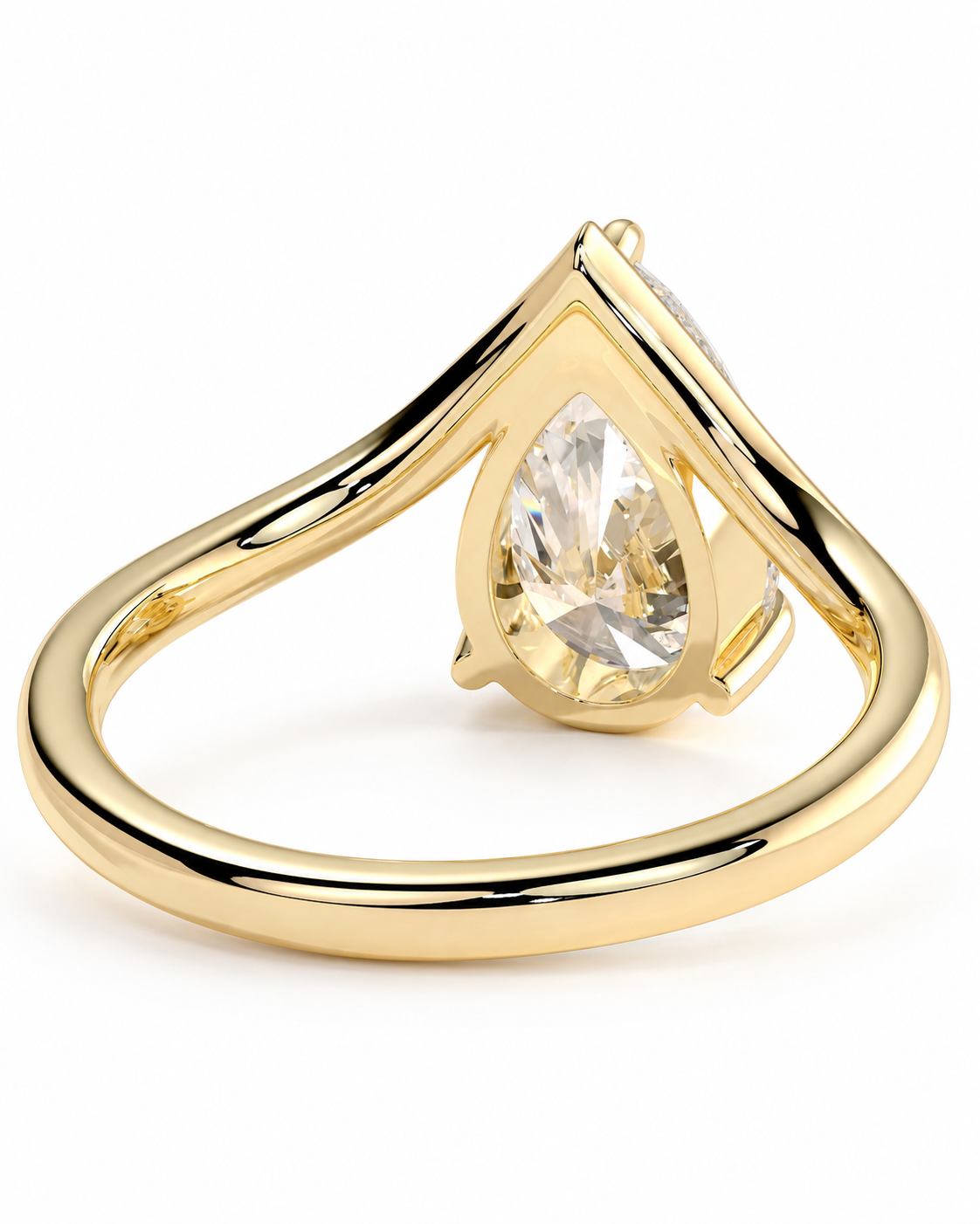 color_10K_YG, color_14K_YG &&A yellow gold ring featuring a large pear-cut clear gemstone in a prong setting, with a smaller side stone, shown on a plain white background.