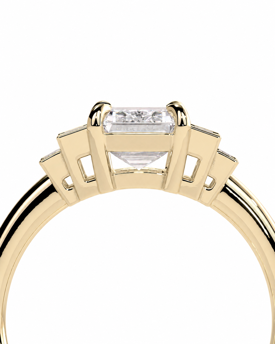 color_10K_YG, color_14K_YG &&A close-up of a yellow gold ring featuring a rectangular clear gemstone in a geometric setting, shown against a plain white background.