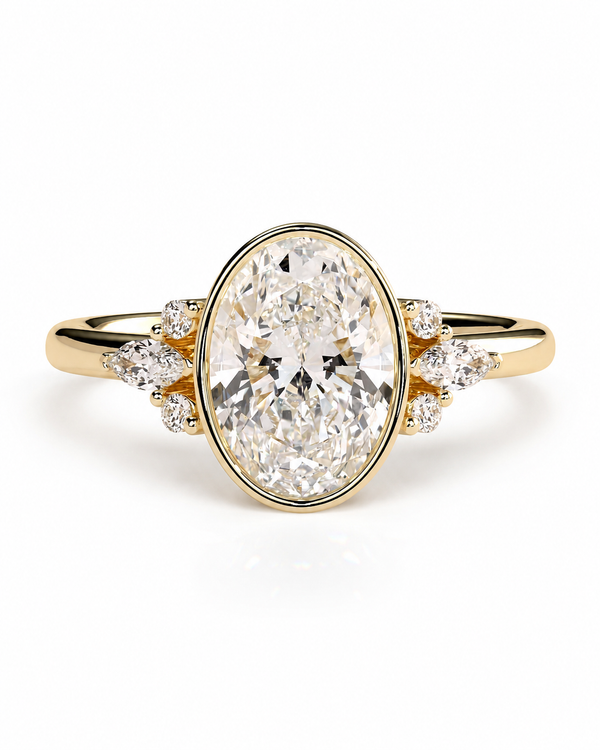 color_10K_YG, color_14K_YG &&A yellow gold ring featuring a large oval-cut diamond center stone with smaller diamond accents on the shoulders, set against a clean white background.