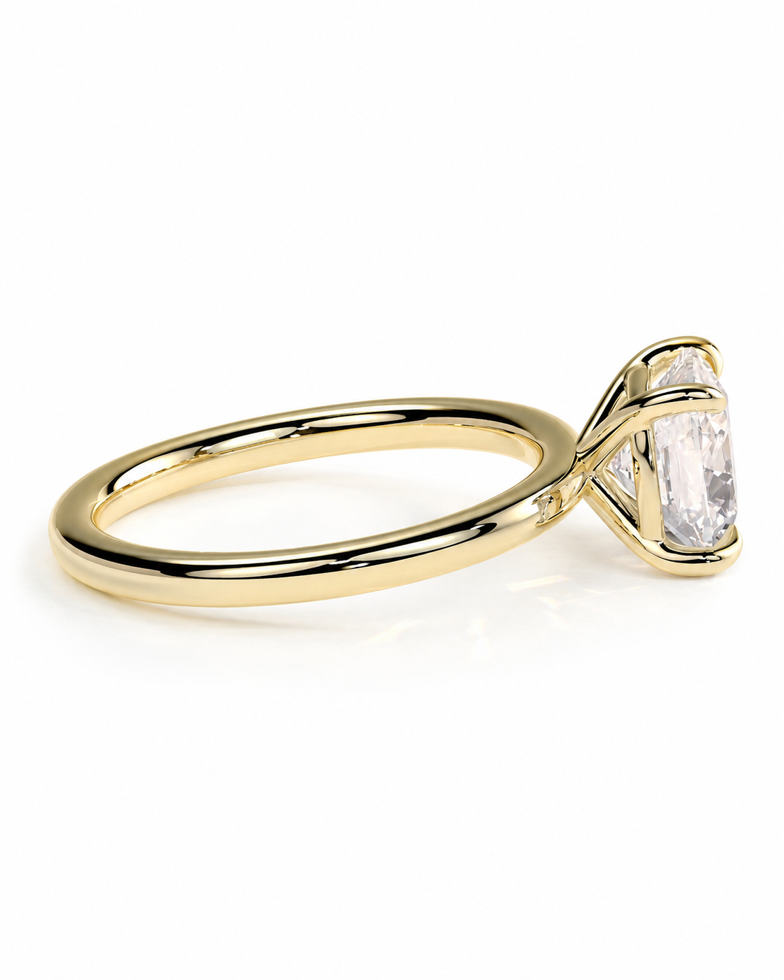 color_10K_YG, color_14K_YG &&A yellow gold solitaire engagement ring featuring a large rectangular clear gemstone in a prong setting, shown on a clean white background.