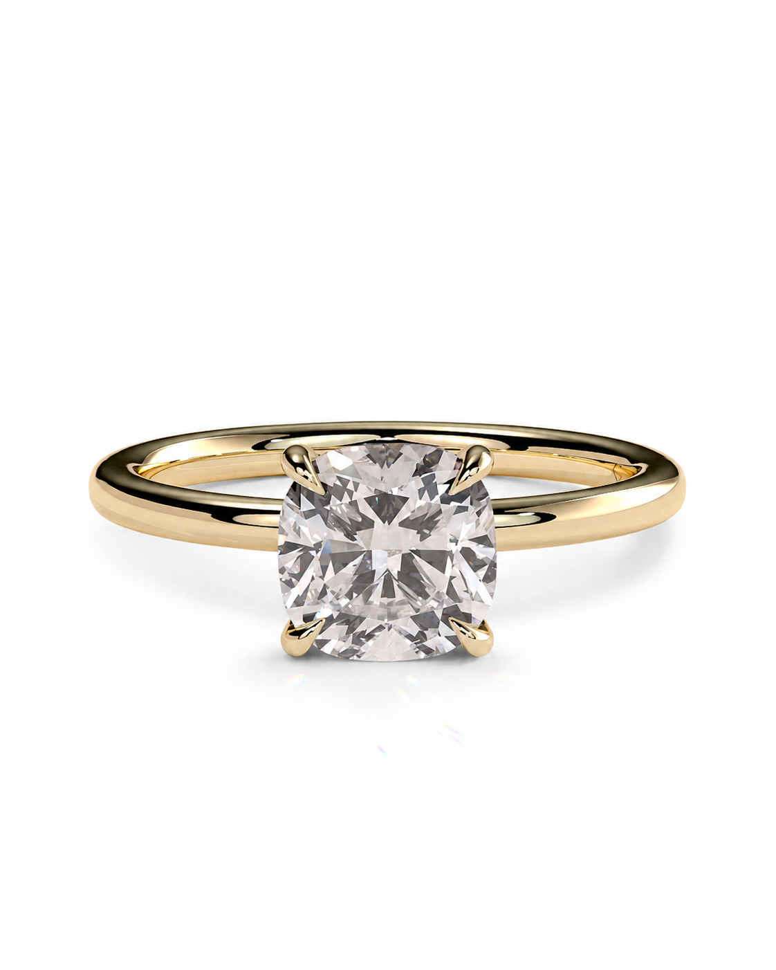 color_10K_YG, color_14K_YG &&A yellow gold solitaire engagement ring featuring a cushion-cut clear gemstone in a four-prong setting, shown on a clean white background.