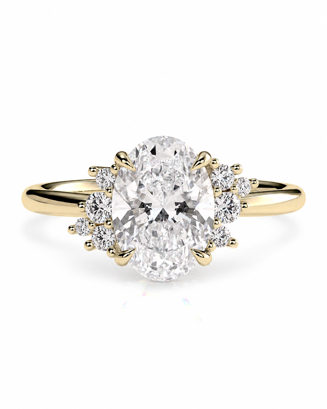 color_10K_YG, color_14K_YG &&A yellow gold ring featuring a large oval-cut clear center stone with smaller round-cut stones on either side, set against a plain white background.