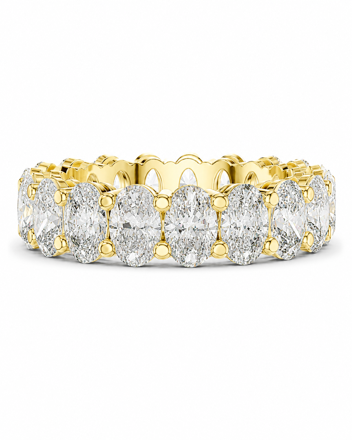 color_10K_YG, color_14K_YG &&	
A yellow gold eternity ring featuring a continuous row of oval-cut clear diamonds in a prong setting, shown against a plain white background.