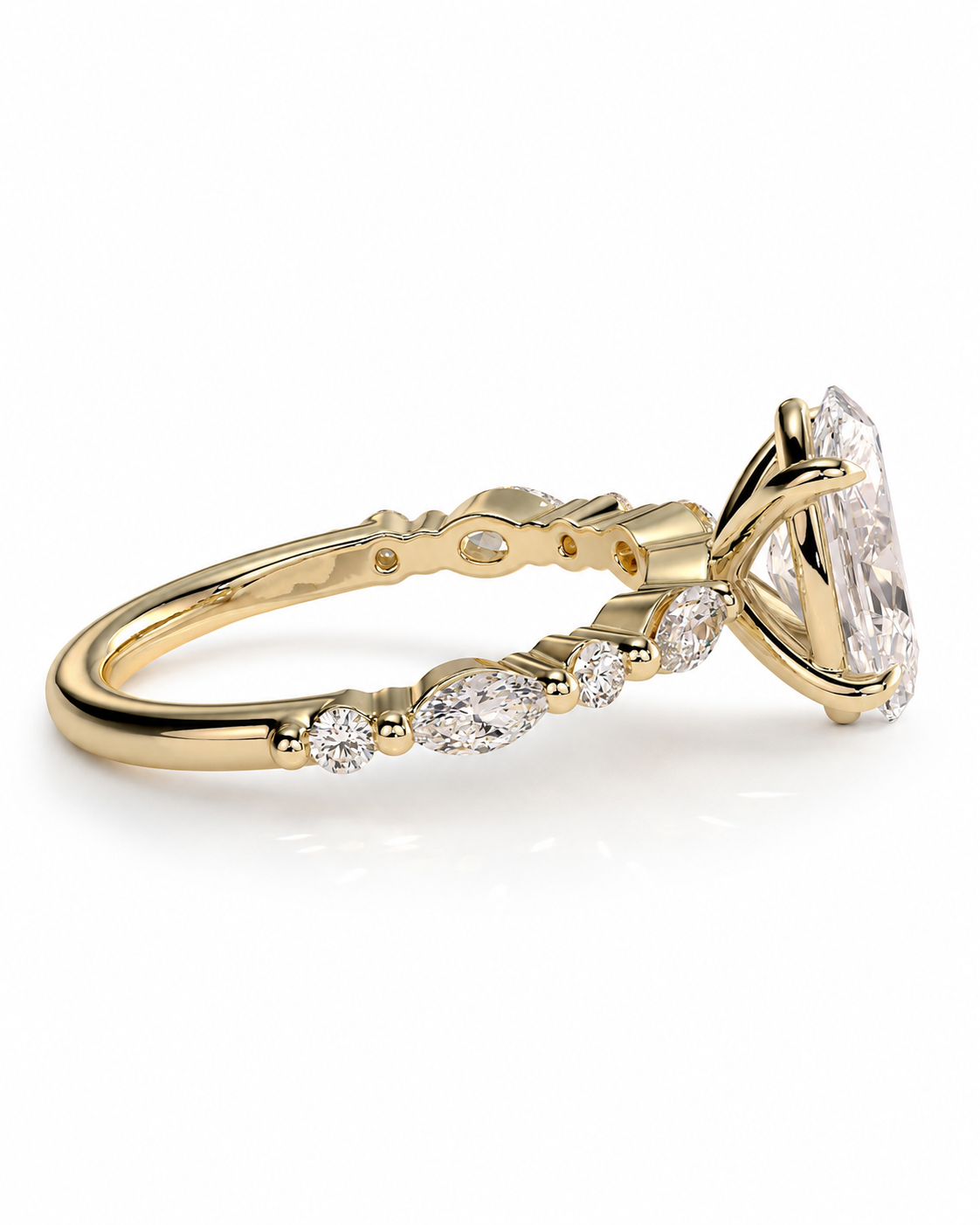 color_10K_YG, color_14K_YG &&
A yellow gold ring featuring a large marquise-cut clear center stone and a row of smaller oval and round stones along the shank, shown on a clean white background.