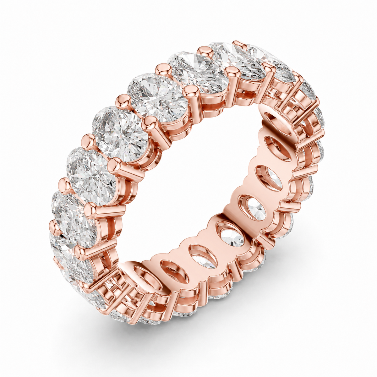 color_10K_RG, color_14K_RG &&	A rose gold eternity ring featuring a continuous row of round brilliant-cut clear gemstones in a prong setting, shown on a clean white background.