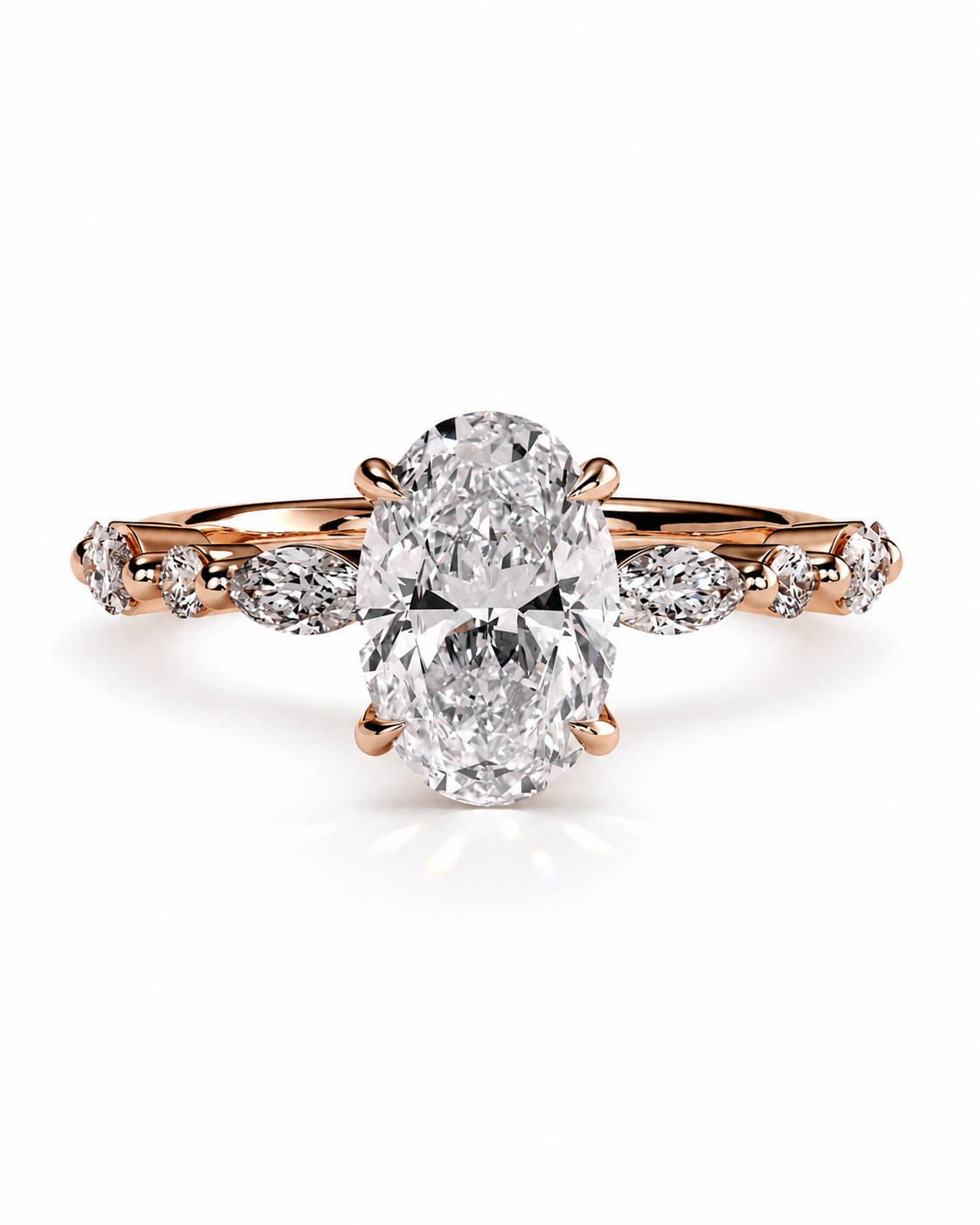 color_10K_RG, color_14K_RG &&
An oval-cut diamond engagement ring with a rose gold band featuring smaller accent diamonds on either side, set against a clean white background.