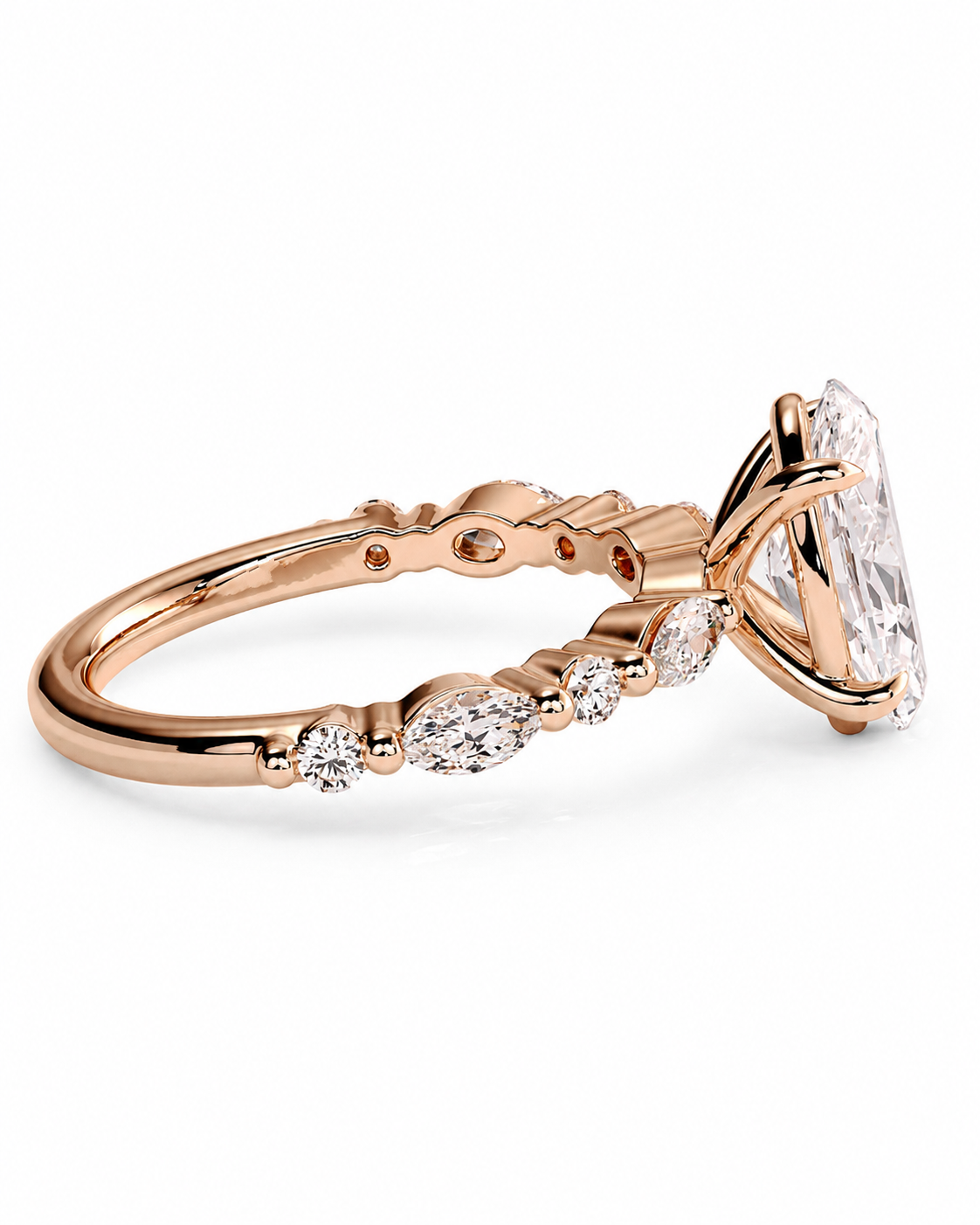 color_10K_RG, color_14K_RG &&
Rose gold diamond ring with a large oval-cut center stone and smaller marquise and round stones along the shank, shown on a white background.
