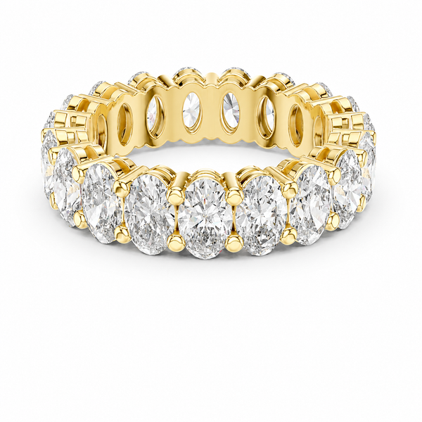 color_10K_YG, color_14K_YG &&	
A yellow gold eternity ring featuring a continuous row of oval-cut clear gemstones in a prong setting, shown on a clean white background.