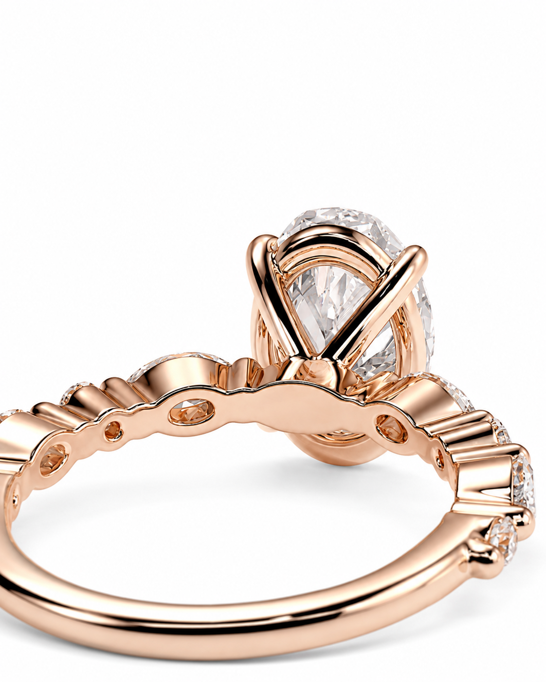color_10K_RG, color_14K_RG &&
Rose gold ring with a large oval clear gemstone in a prong setting, shown on a clean white background.