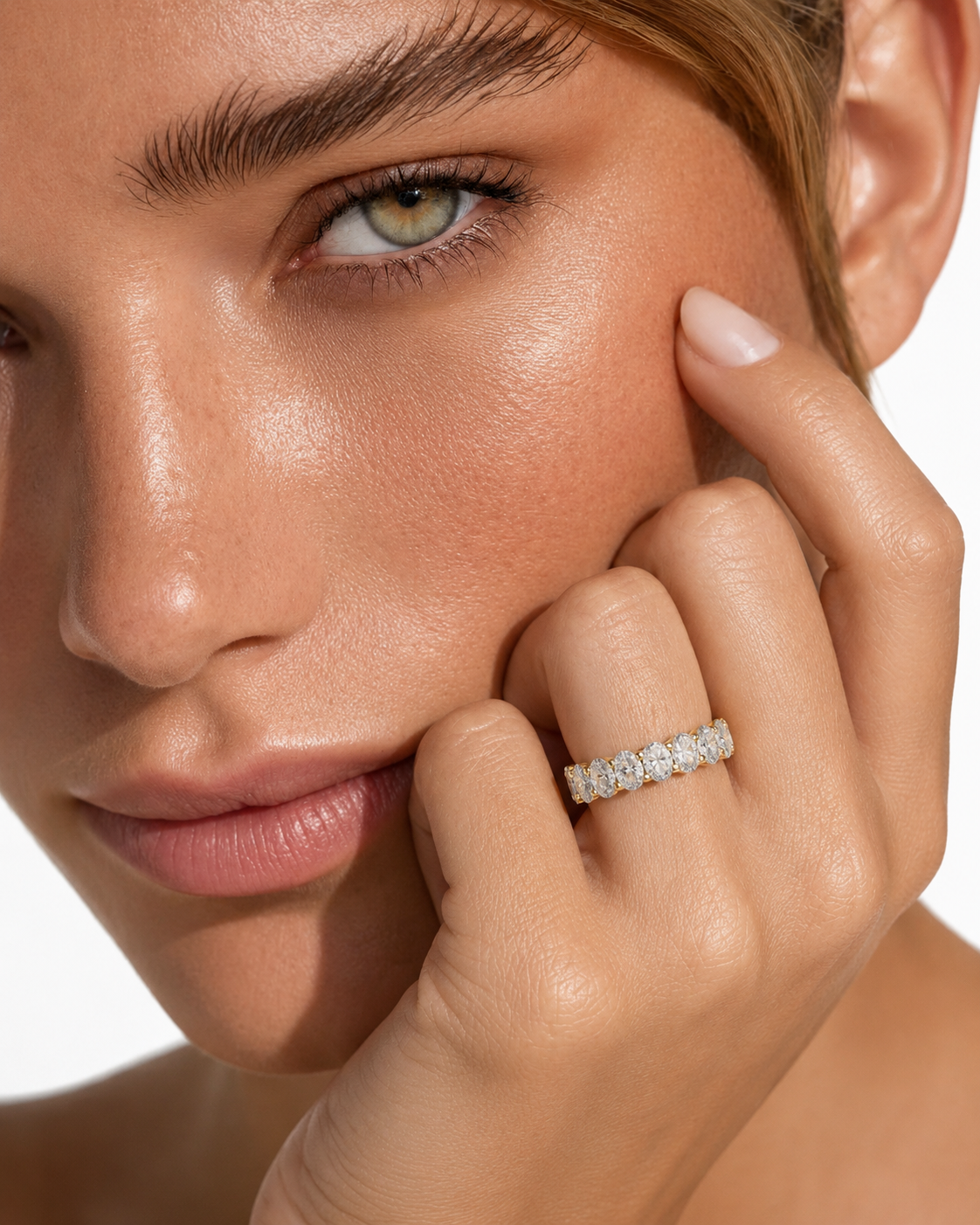 color_10K_YG, color_14K_YG &&	
Close-up view of oval stone moissanite wedding band craftsmanship
