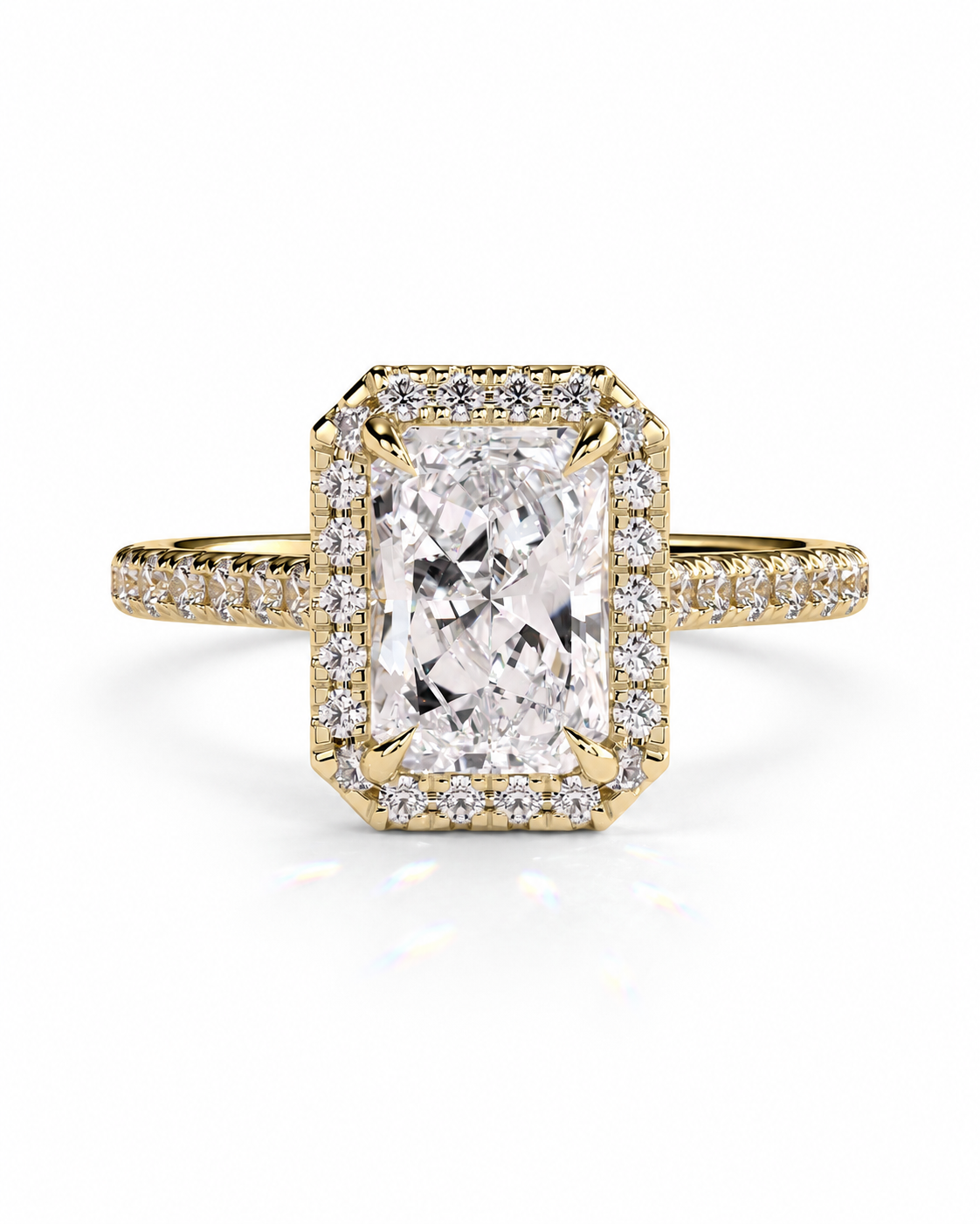 color_10K_YG, color_14K_YG &&A yellow gold ring featuring a large rectangular emerald-cut diamond center stone surrounded by a double halo of small diamonds, with a diamond-encrusted shank, shown on a white background.