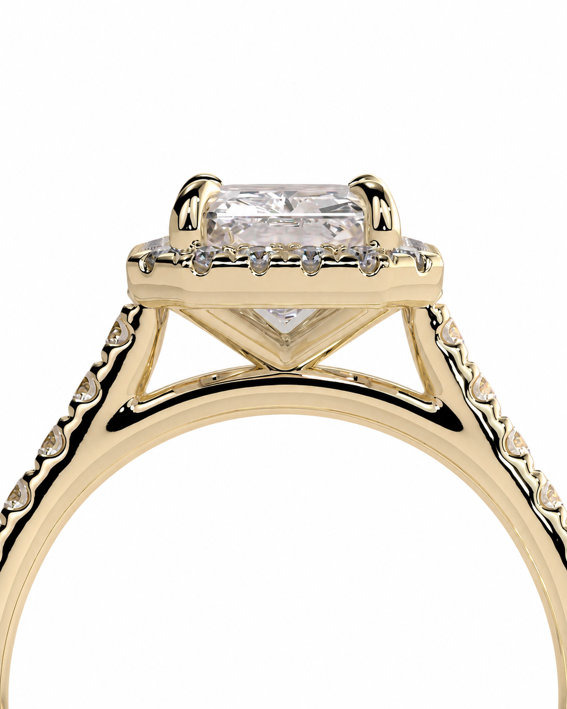 color_10K_YG, color_14K_YG &&A close-up of a yellow gold ring featuring a rectangular clear gemstone in a prong setting, with small accent stones along the band, shown against a plain white background.