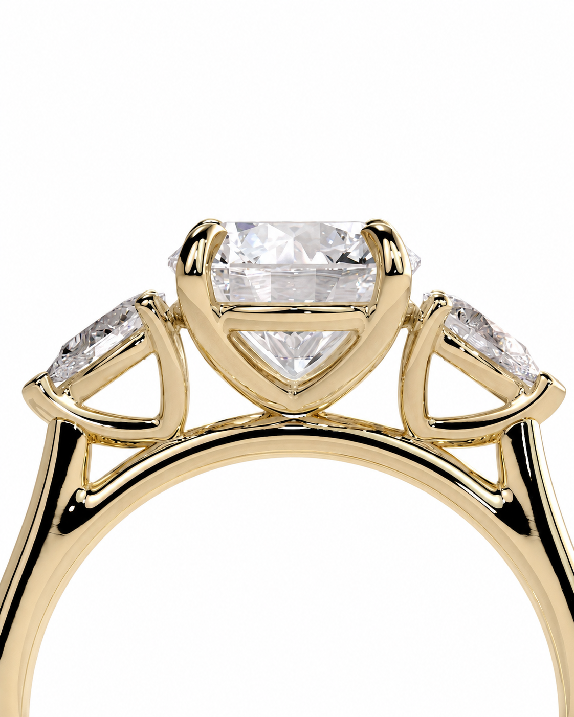color_10K_YG, color_14K_YG &&A close-up of a yellow gold ring featuring a large rectangular center stone and two smaller marquise-cut side stones, shown against a plain white background.