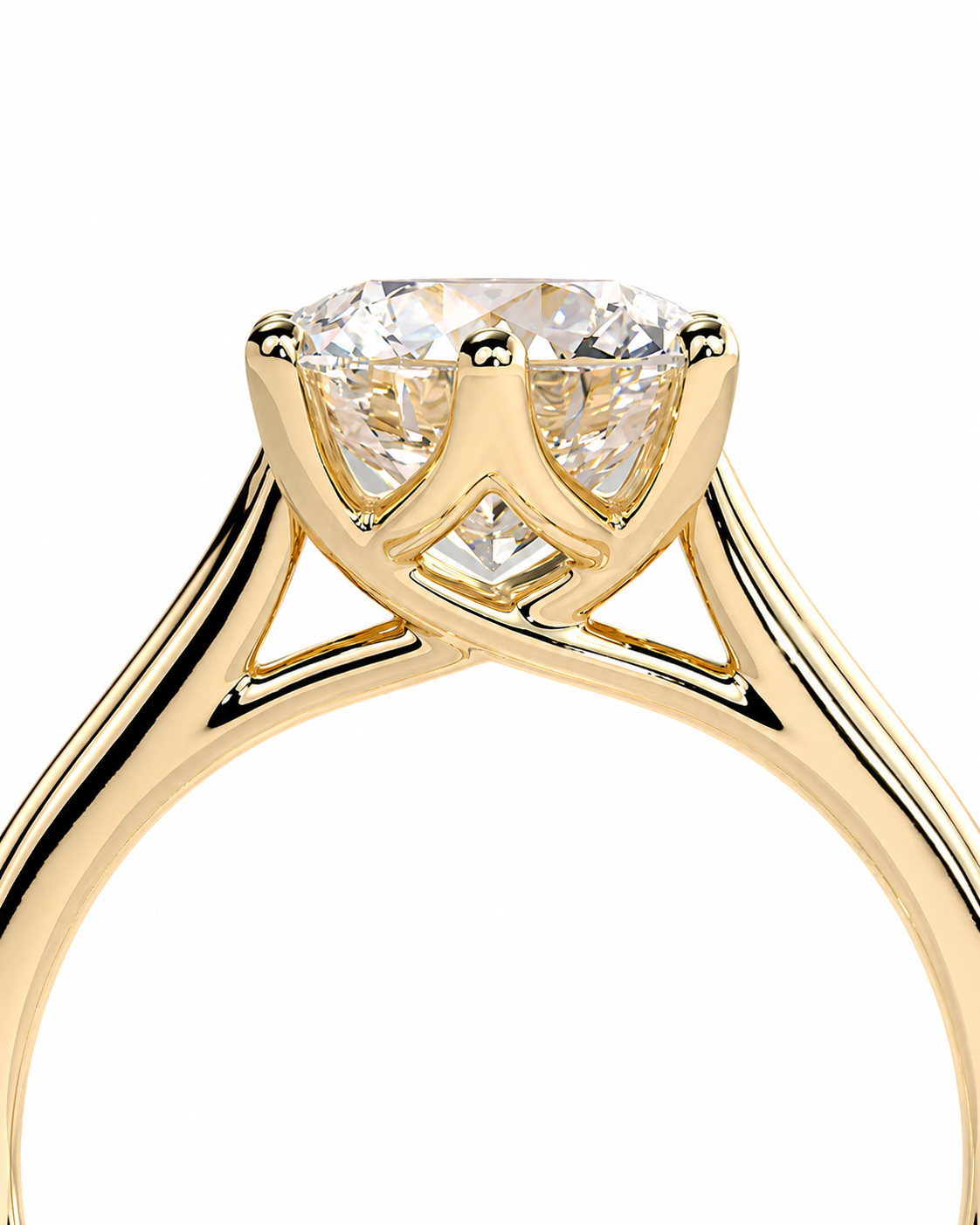 color_10K_YG, color_14K_YG &&A close-up studio shot of a yellow gold solitaire engagement ring with a round brilliant-cut diamond, set against a solid white background.