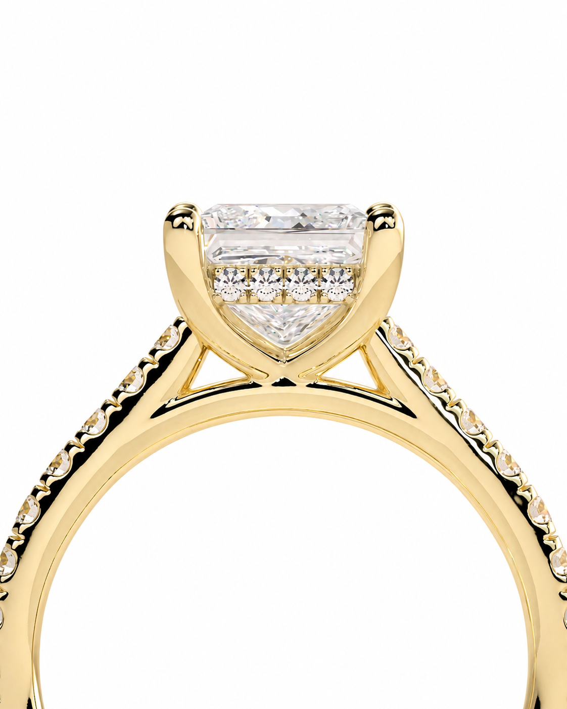 color_10K_YG, color_14K_YG &&A close-up of a yellow gold ring featuring a large rectangular baguette-cut center stone and smaller accent stones along the shoulders, set against a plain white background.