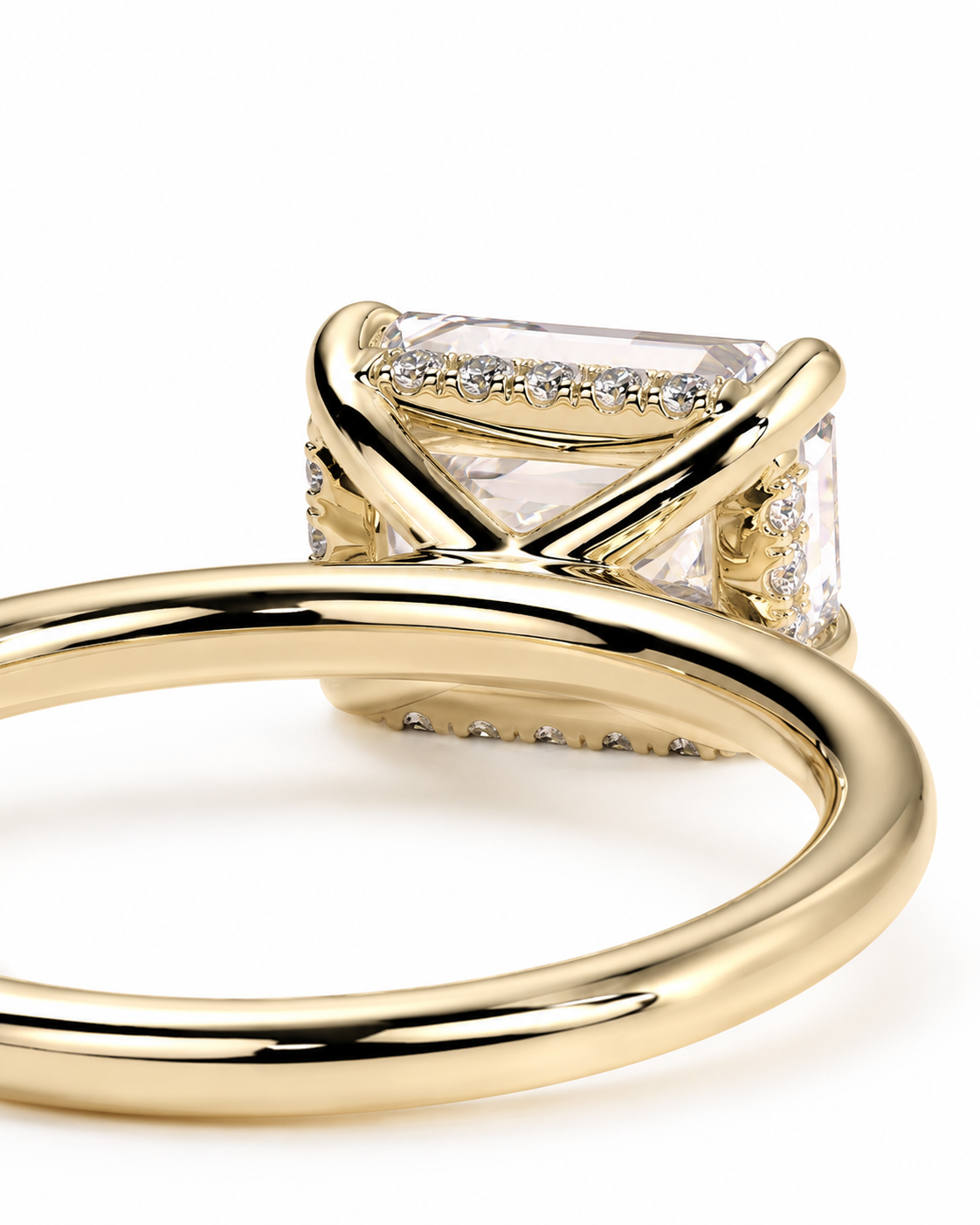color_10K_YG, color_14K_YG &&A close-up of a yellow gold ring featuring a rectangular clear gemstone in a prong setting with small accent diamonds along the top and sides, shown on a white background.