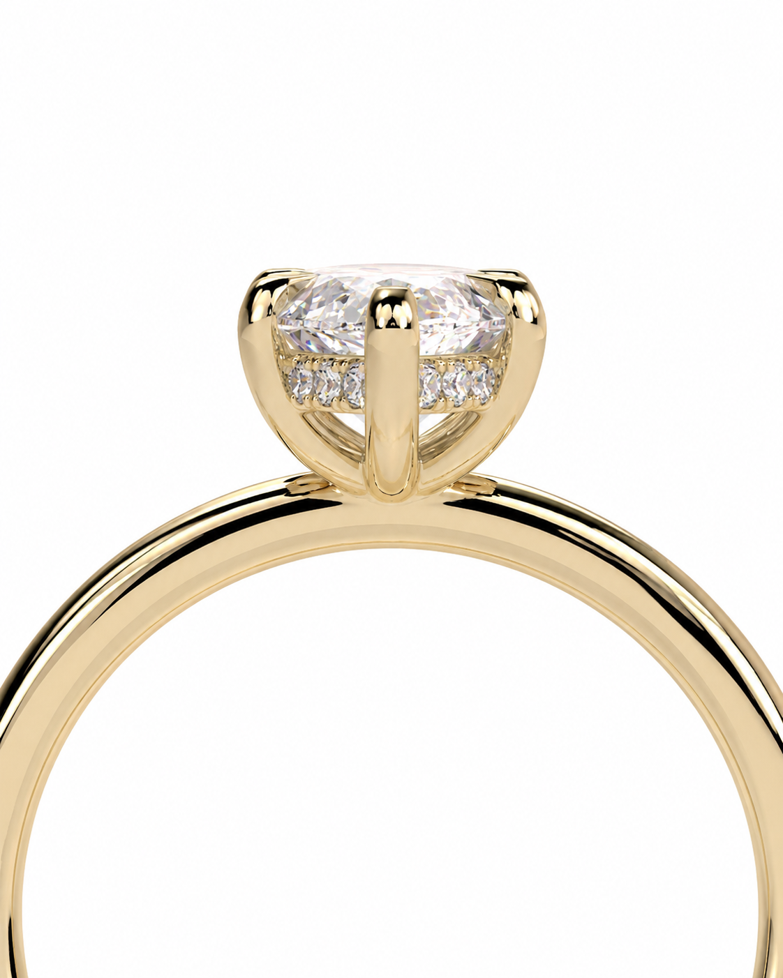 color_10K_YG, color_14K_YG &&A close-up shot of a yellow gold ring featuring a round brilliant-cut center stone and a halo of smaller diamonds on a plain white background.