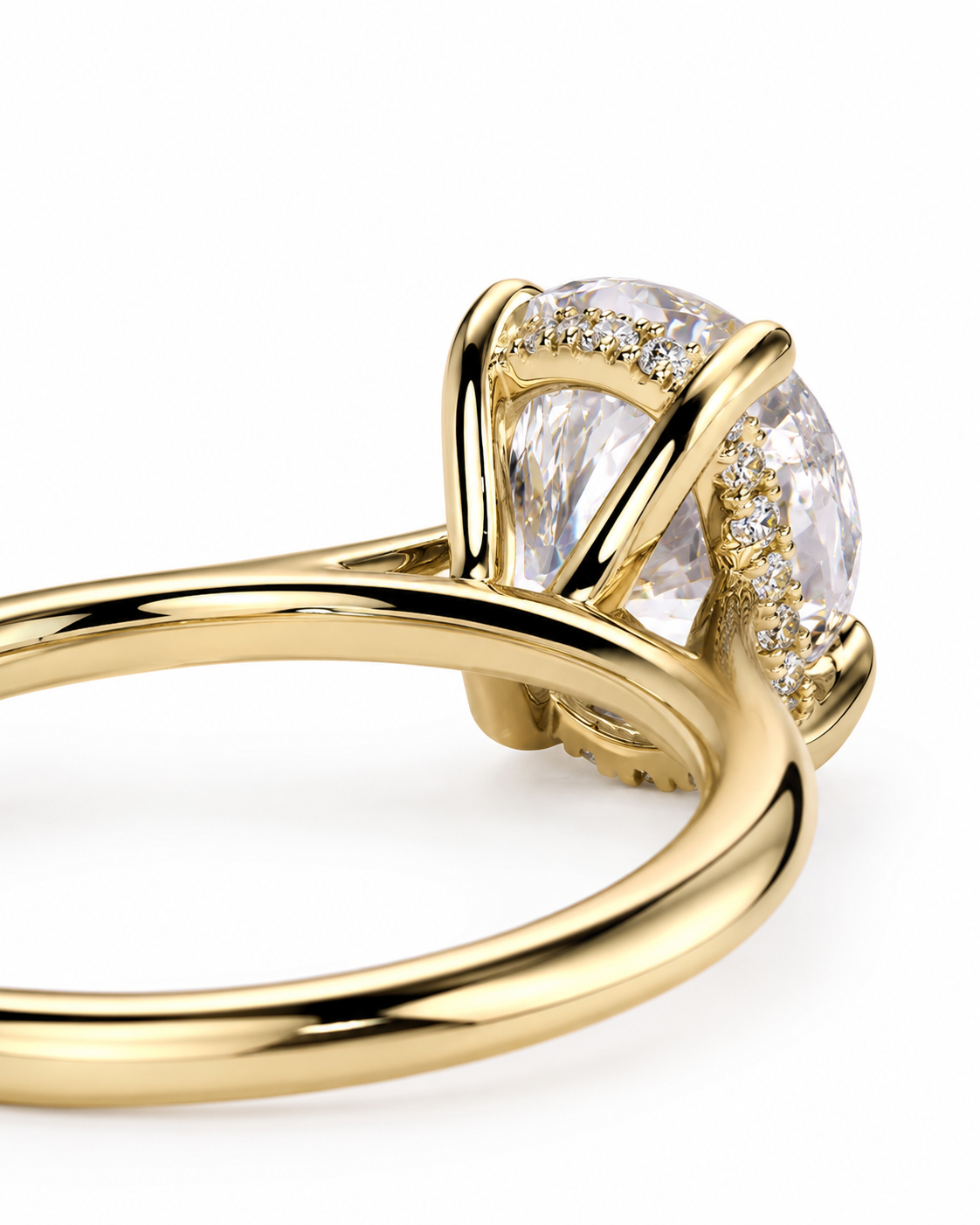 color_10K_YG, color_14K_YG &&A close-up shot of a yellow gold ring featuring a large oval-cut clear center stone and small accent stones along the band, set against a plain white background.