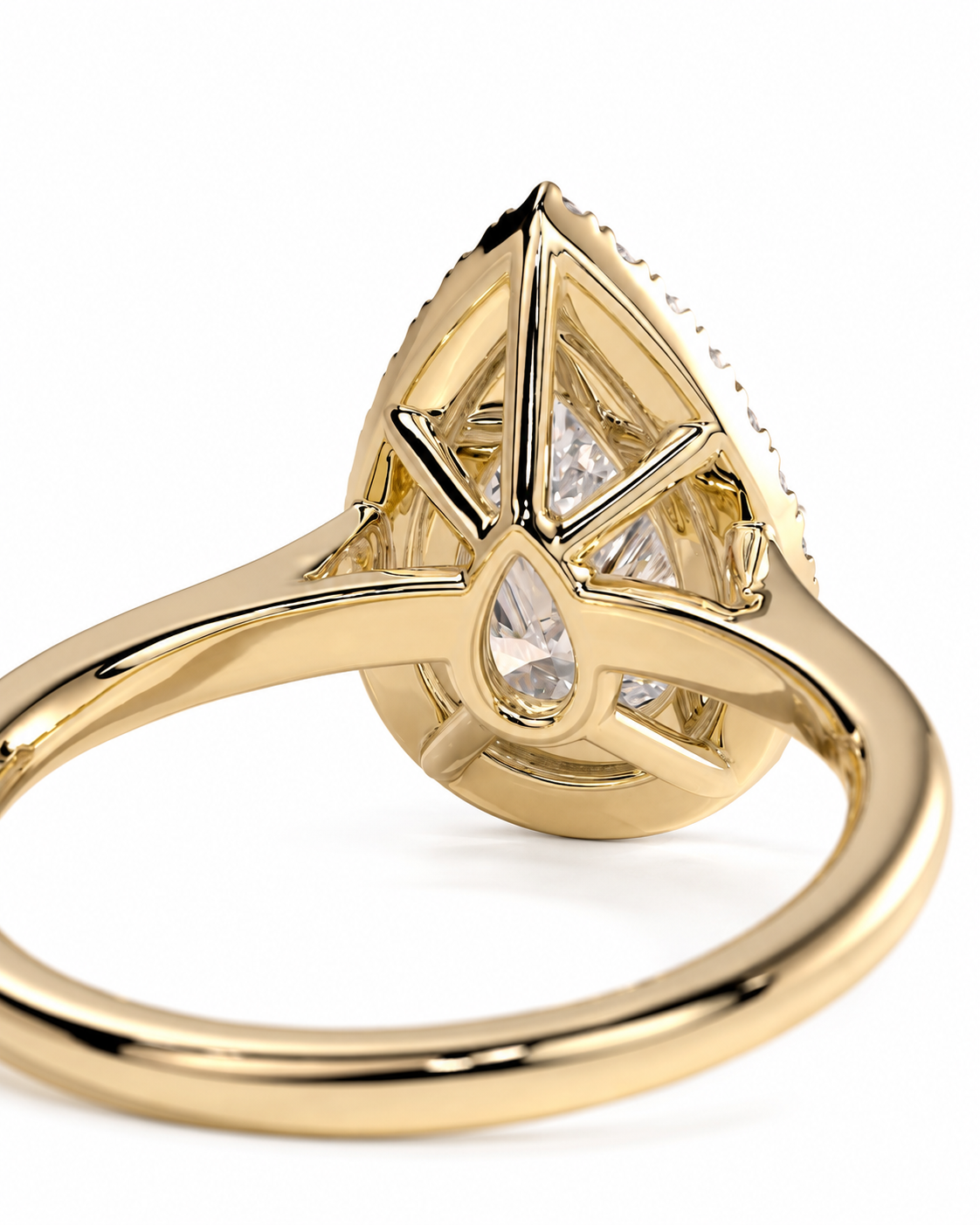 color_10K_YG, color_14K_YG &&A close-up shot of a gold ring featuring a geometric triangular setting with clear gemstones, including a teardrop-shaped center stone, on a white background.