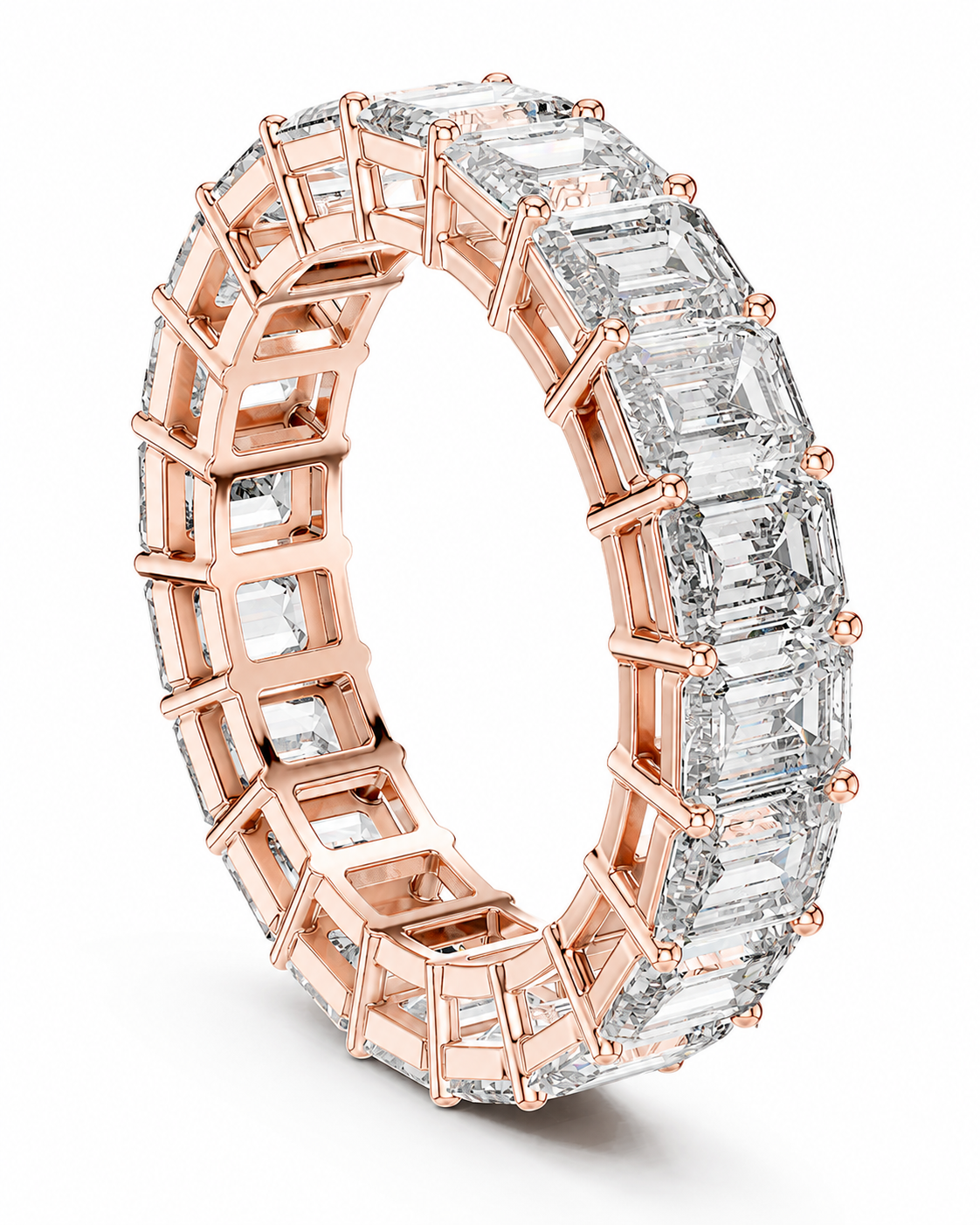 color_10K_RG, color_14K_RG &&	A rose gold eternity ring featuring baguette-cut clear gemstones, shown on a clean white background.