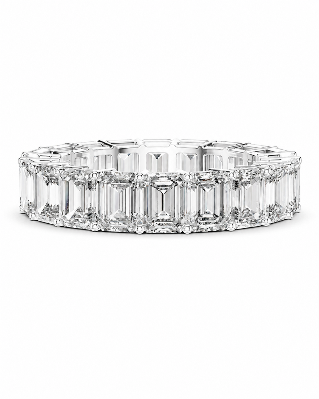 color_925_SIL,color_935_ARG,color_10K_WG, color_14K_WG &&	
A diamond eternity ring featuring a continuous row of emerald-cut diamonds in a silver-toned setting, presented on a clean white background.