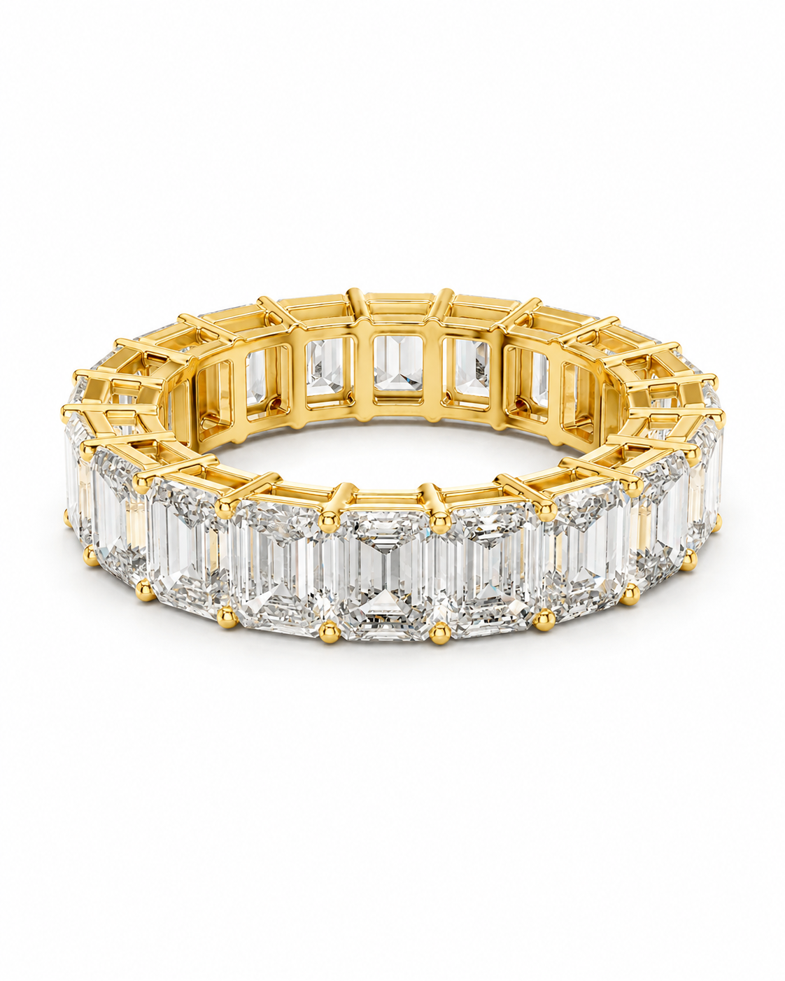 color_10K_YG, color_14K_YG &&	
A yellow gold eternity ring featuring baguette-cut clear stones on the front and side, photographed on a clean white background.