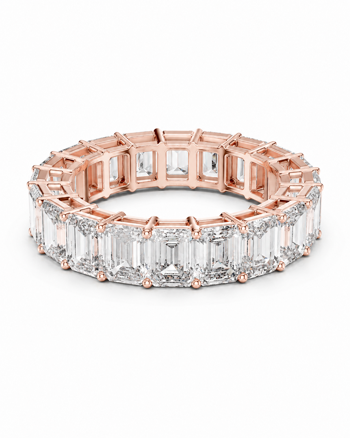 color_10K_RG, color_14K_RG &&	A rose gold eternity ring featuring a continuous row of baguette-cut clear gemstones, shown on a clean white background.