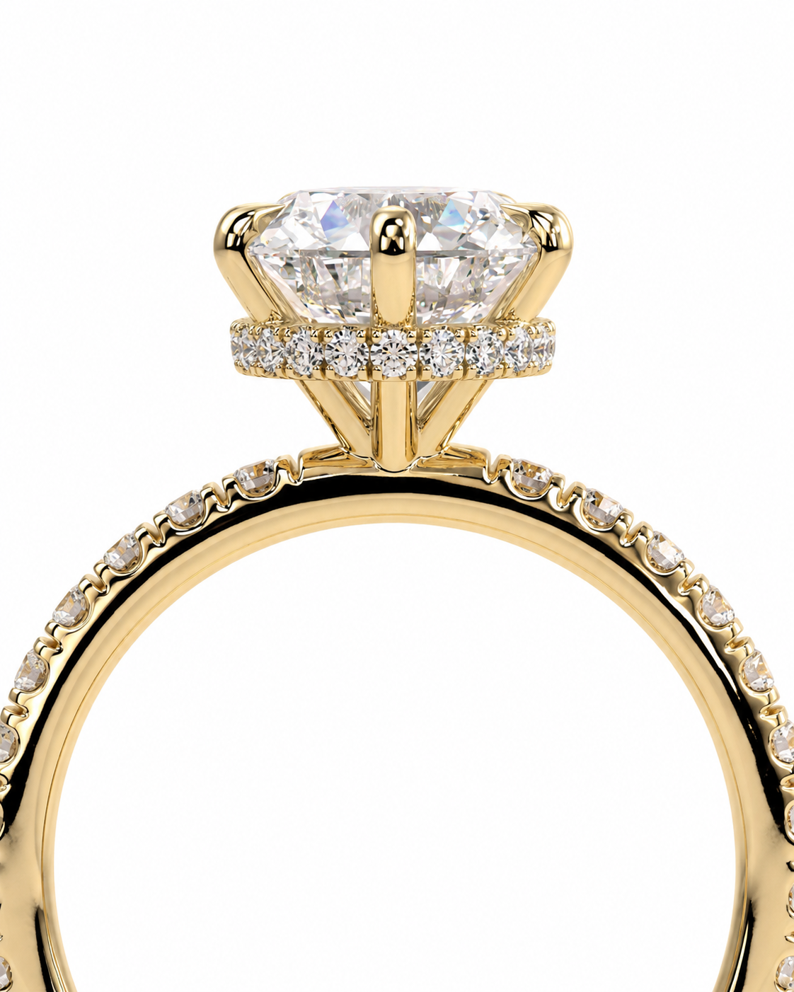color_10K_YG, color_14K_YG &&
A close-up of a yellow gold ring featuring a large round brilliant-cut diamond center stone in a four-prong setting, accented by a halo of small diamonds and a diamond-paved shank, shown against a solid white background.