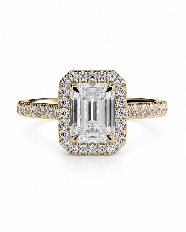color_10K_YG, color_14K_YG &&A yellow gold ring featuring a large rectangular emerald-cut diamond center stone surrounded by a round diamond halo, with a diamond-paved shank, shown on a white background.
