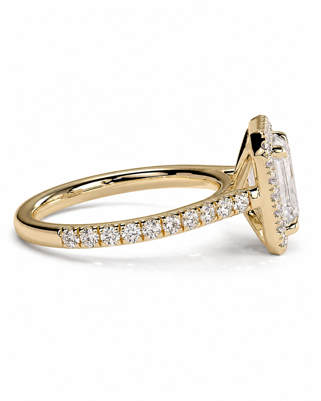 color_10K_YG, color_14K_YG &&A yellow gold ring featuring a large emerald-cut center stone and a pavé band with small round stones, shown on a clean white background.