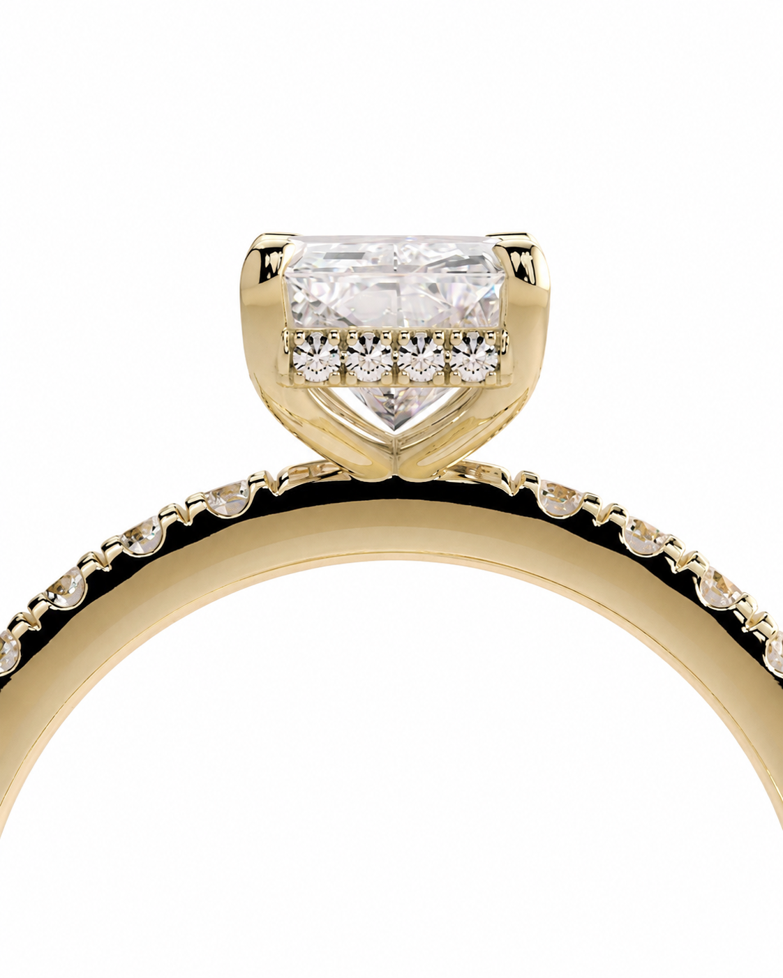 color_10K_YG, color_14K_YG &&A close-up of a yellow gold ring featuring a large heart-shaped clear gemstone in a prong setting, with smaller diamonds along the band, shown against a plain white background.