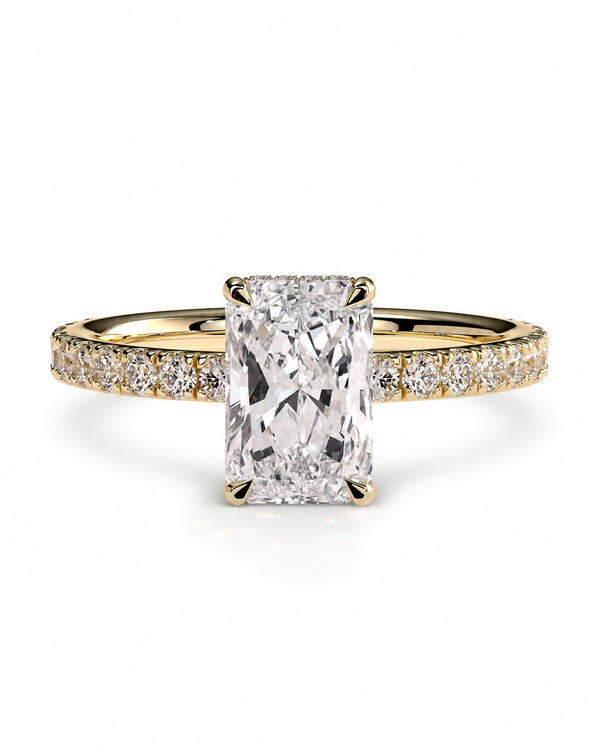 color_10K_YG, color_14K_YG &&A yellow gold engagement ring featuring a large rectangular radiant-cut diamond center stone, with a pavé-set diamond band, shown on a clean white background.