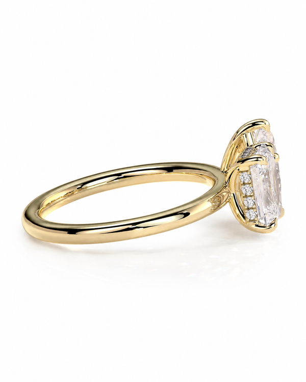 color_10K_YG, color_14K_YG &&A yellow gold ring with a large rectangular clear gemstone and smaller accent stones on the setting, shown on a clean white background.