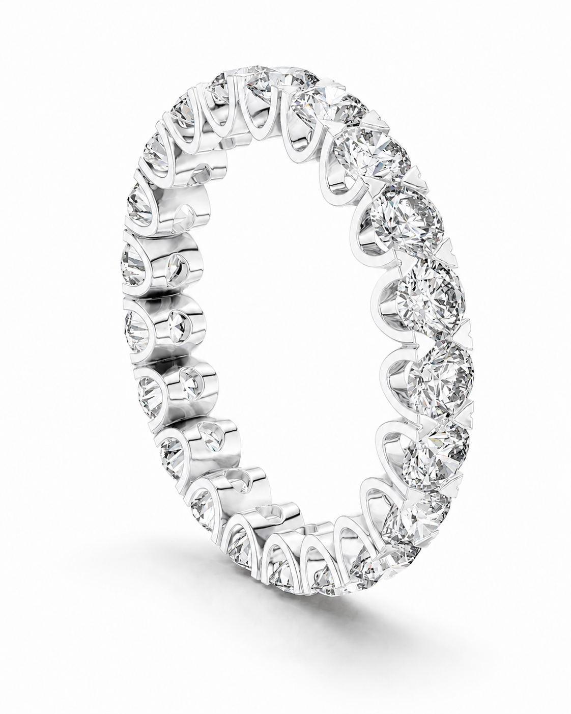 color_925_SIL,color_935_ARG,color_10K_WG, color_14K_WG &&	
A silver-toned eternity ring set with round brilliant-cut diamonds, shown at an angle on a clean white background.