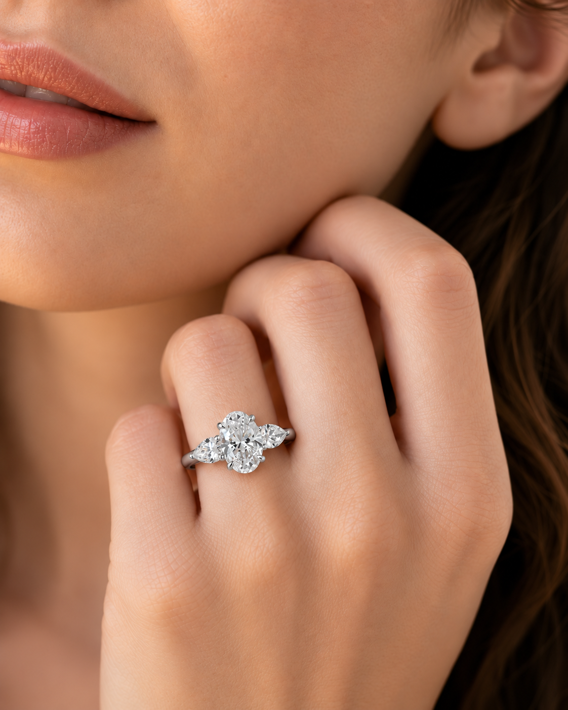 color_925_SIL,color_935_ARG,color_10K_WG, color_14K_WG &&
A close-up lifestyle shot of a woman's hand wearing a silver-toned ring with a floral cluster of clear gemstones.