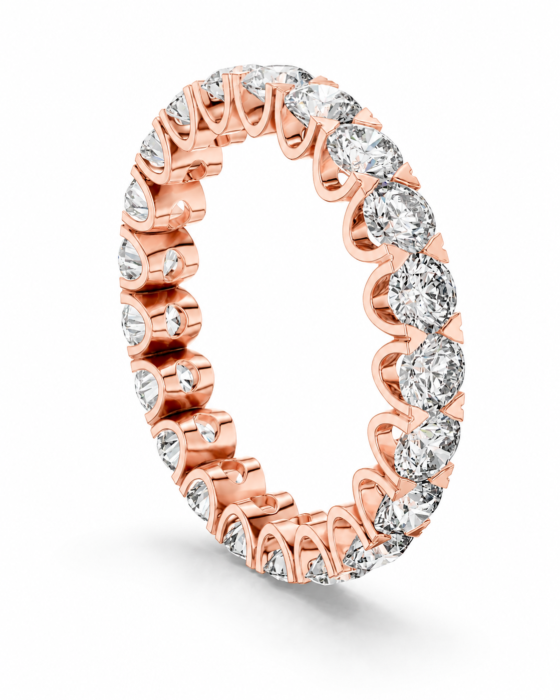 color_10K_RG, color_14K_RG &&	A rose gold eternity ring set with round brilliant-cut diamonds, shown on a clean white background.