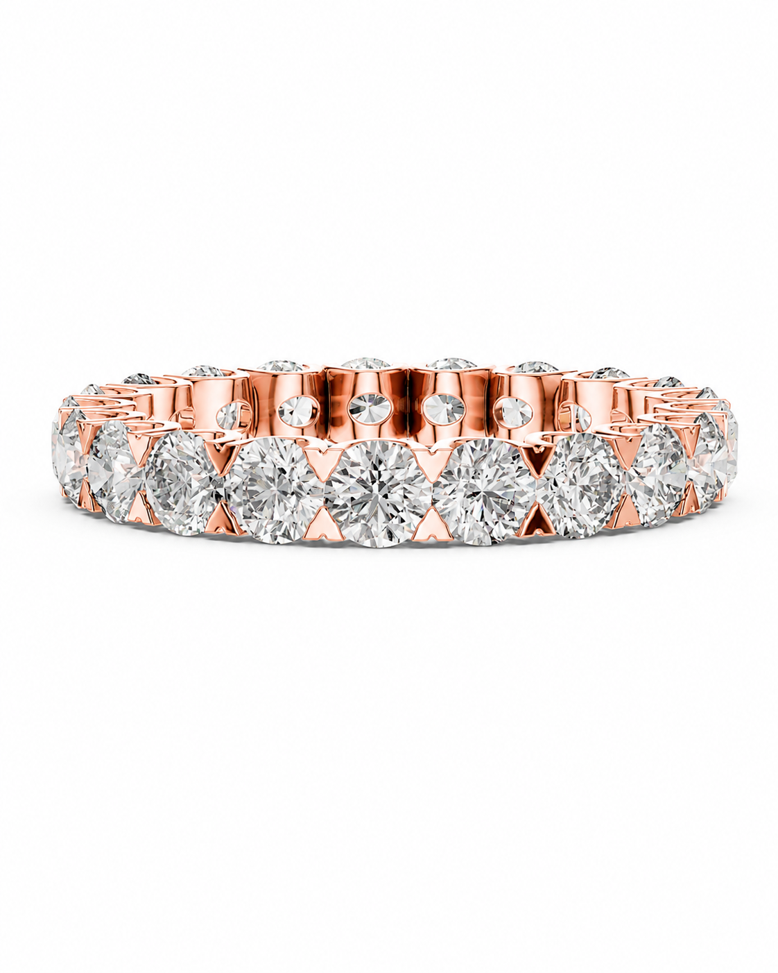 color_10K_RG, color_14K_RG &&	A rose gold eternity ring featuring a continuous row of round brilliant-cut diamonds set in a polished rose gold band, shown against a plain white background.