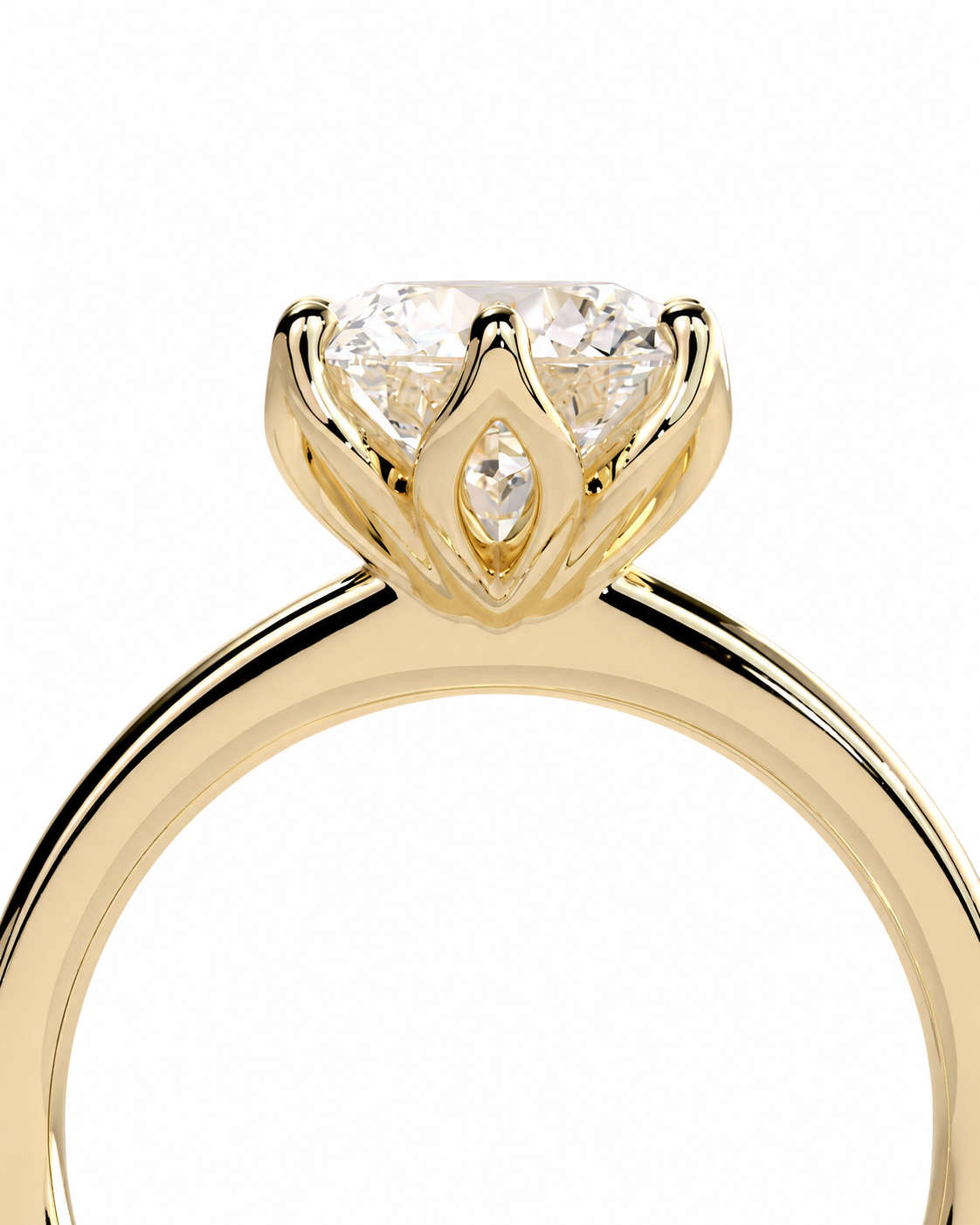 color_10K_YG, color_14K_YG &&A close-up of a yellow gold ring with a large round brilliant-cut diamond center stone and a smaller marquise-cut diamond accent, set against a plain white background.