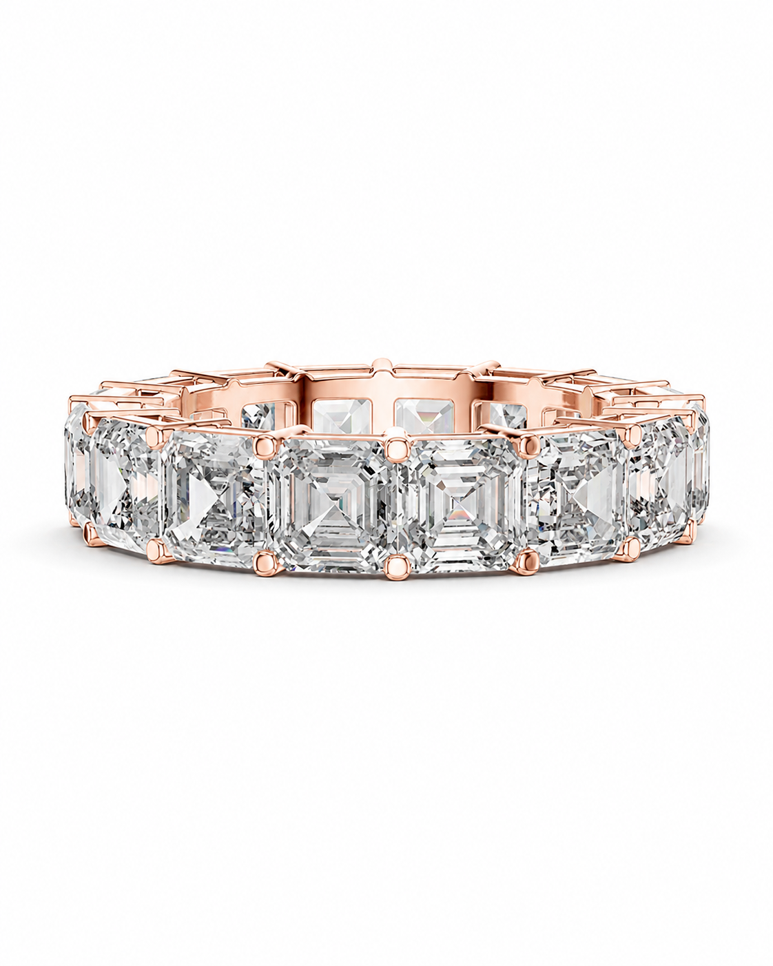color_10K_RG, color_14K_RG &&	A rose gold eternity ring featuring a continuous row of baguette-cut clear gemstones, shown on a clean white background.